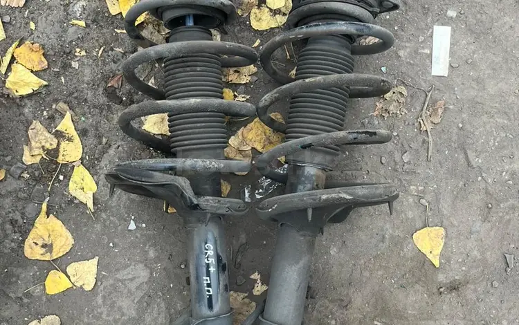 Аммортизатора стойка амортизатора в сборе с пружиной и опорным подшипником за 25 000 тг. в Астана