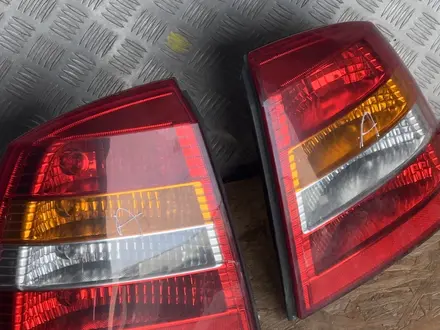 Задние фонари Opel Astra g за 2 777 тг. в Актобе