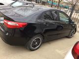 Kia Rio 2013 года за 4 700 000 тг. в Актобе – фото 2