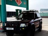 Nissan Patrol 1998 годаүшін6 000 000 тг. в Жанатас