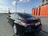 Toyota Camry 2019 года за 14 200 000 тг. в Жезказган – фото 4