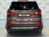 Hyundai Santa Fe 2014 года за 9 200 000 тг. в Алматы – фото 4