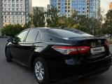 Toyota Camry 2021 года за 13 600 000 тг. в Караганда – фото 4