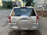 Suzuki Grand Vitara 2012 года за 6 500 000 тг. в Астана – фото 4