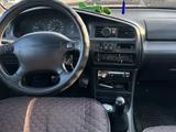 Mazda 323 1996 года за 400 000 тг. в Рудный – фото 2