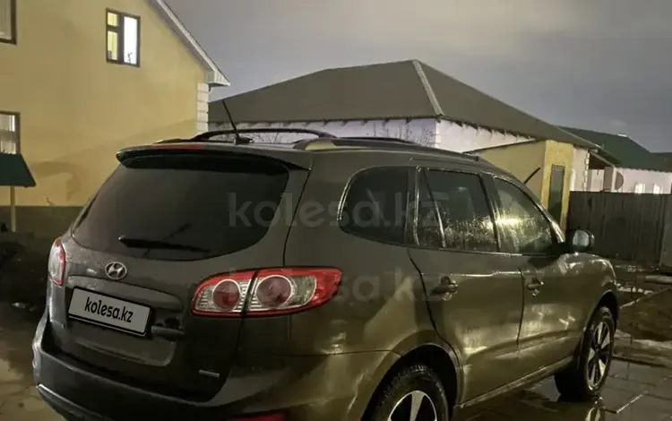 Hyundai Santa Fe 2012 годаүшін6 300 000 тг. в Атырау