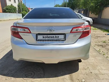 Toyota Camry 2014 года за 7 800 000 тг. в Актобе – фото 8