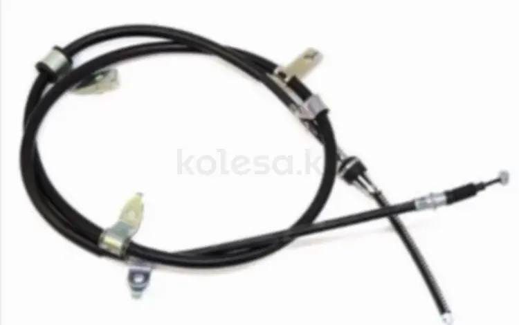 Трос ручного тормоза Левый за 16 950 тг. в Астана