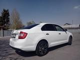 Skoda Rapid 2014 года за 4 500 000 тг. в Алматы – фото 2