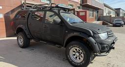 Mitsubishi L200 2011 года за 7 500 000 тг. в Астана – фото 3