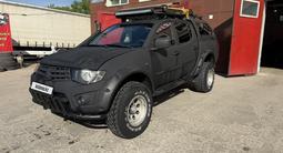 Mitsubishi L200 2011 года за 7 500 000 тг. в Астана – фото 2