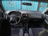 Mazda 626 1997 года за 1 650 000 тг. в Актобе – фото 5