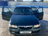 Mazda 626 1999 года за 2 700 000 тг. в Актобе – фото 4