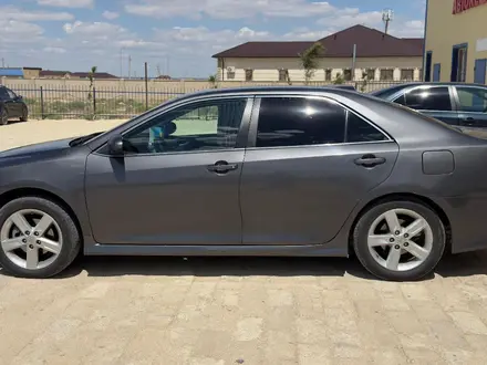 Toyota Camry 2014 года за 7 800 000 тг. в Бейнеу