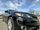 Toyota Camry 2014 года за 6 500 000 тг. в Жанаозен