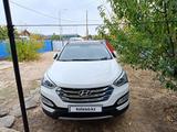 Hyundai Santa Fe 2013 года за 8 500 000 тг. в Атырау – фото 2