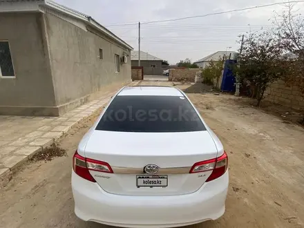 Toyota Camry 2014 года за 6 500 000 тг. в Жанаозен – фото 11