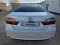 Toyota Camry 2014 года за 11 200 000 тг. в Жанаозен – фото 4