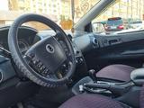 SsangYong Nomad 2014 года за 5 400 000 тг. в Актау – фото 3
