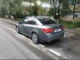 Chevrolet Cruze 2010 года за 3 100 000 тг. в Алматы – фото 2