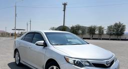Toyota Camry 2012 года за 6 900 000 тг. в Жанаозен