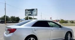Toyota Camry 2012 года за 6 900 000 тг. в Жанаозен – фото 2