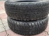 Зимние DUNLOP, пара, дешево за 10 000 тг. в Алматы