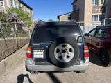 Suzuki Grand Vitara 1999 годаfor2 000 000 тг. в Караганда