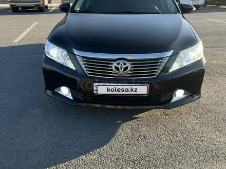 Toyota Camry 2014 года за 9 500 000 тг. в Караганда