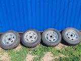 Комплект зимней резины вместе с дисками за 70 000 тг. в Аулиеколь