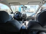 Mazda 323 1998 года за 1 200 000 тг. в Рудный – фото 5