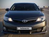 Toyota Camry 2013 года за 9 699 900 тг. в Жанаозен – фото 4