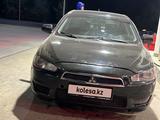 Mitsubishi Lancer 2013 года за 3 900 000 тг. в Актобе – фото 2