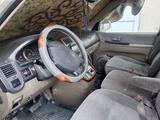 Kia Carnival 2002 года за 1 700 000 тг. в Байсерке – фото 4