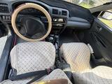 Mazda 323 1997 года за 800 000 тг. в Шымкент – фото 4