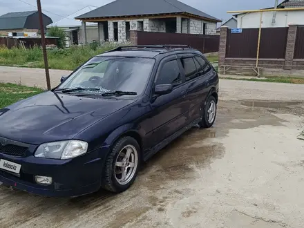 Mazda 323 2000 года за 2 100 000 тг. в Алматы – фото 3