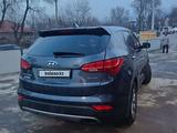 Hyundai Santa Fe 2015 года за 9 500 000 тг. в Алматы – фото 5