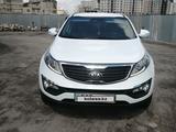 Kia Sportage 2013 года за 7 750 000 тг. в Актобе – фото 2