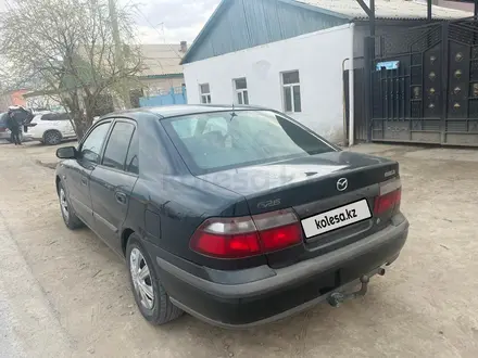 Mazda 626 1998 года за 2 300 000 тг. в Кызылорда – фото 11