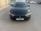 Mitsubishi Lancer 2010 годаfor3 900 000 тг. в Астана – фото 2
