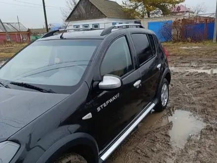 Renault Sandero 2013 года за 4 000 000 тг. в Уральск – фото 10