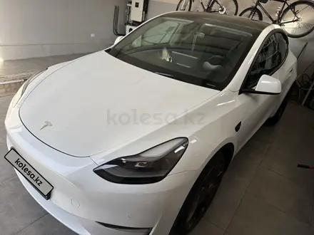 Tesla Model Y 2023 года за 21 500 000 тг. в Алматы