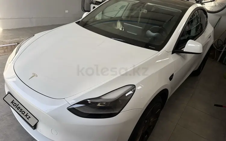 Tesla Model Y 2023 года за 21 500 000 тг. в Алматы