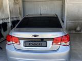 Chevrolet Cruze 2013 года за 5 300 000 тг. в Атырау – фото 2