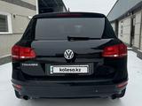 Volkswagen Touareg 2012 года за 11 700 000 тг. в Алматы – фото 4