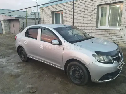 Renault Logan 2014 года за 3 500 000 тг. в Уральск – фото 2