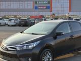 Toyota Corolla 2013 года за 4 700 000 тг. в Актобе – фото 2