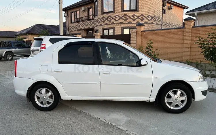 Renault Logan 2013 года за 3 300 000 тг. в Атырау