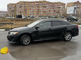 Toyota Camry 2012 года за 7 500 000 тг. в Актобе – фото 2