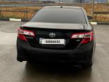 Toyota Camry 2012 года за 7 500 000 тг. в Актобе – фото 4